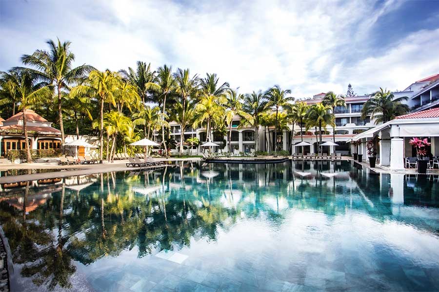 Indulge in a beach package at Mauricia Beachcomber Resort & Spa, designed in a classic Mediterranean fashion. Public areas are tailored to offer stunning views of the bay.