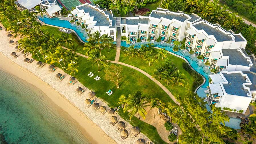 Nestled along the northwestern coast of Mauritius, Victoria Beachcomber Resort & Spa is perfectly positioned between the bustling tourist center of Grand Baie and the capital city, Port Louis. Embracing stunning sunsets, Victoria Beachcomber stands as a beloved choice for family getaways in Mauritius.