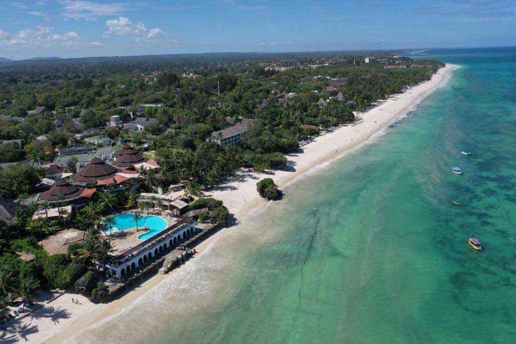 Experience unparalleled luxury at a resort perched on a coral cliff overlooking the Indian Ocean, set amid tropical gardens that lead to the pristine sands of Diani Beach—Kenya's top beach destination. Explore our Kenya packages including flights for the ultimate getaway.