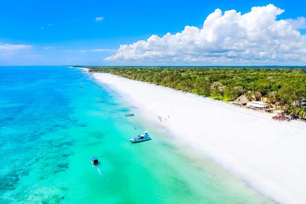 Nestled within 25 acres of native forest, The Sands at Nomad boasts 225 meters of pristine Kenyan coastline. Each room offers en-suite bathrooms, hairdryers, and individual air conditioning.