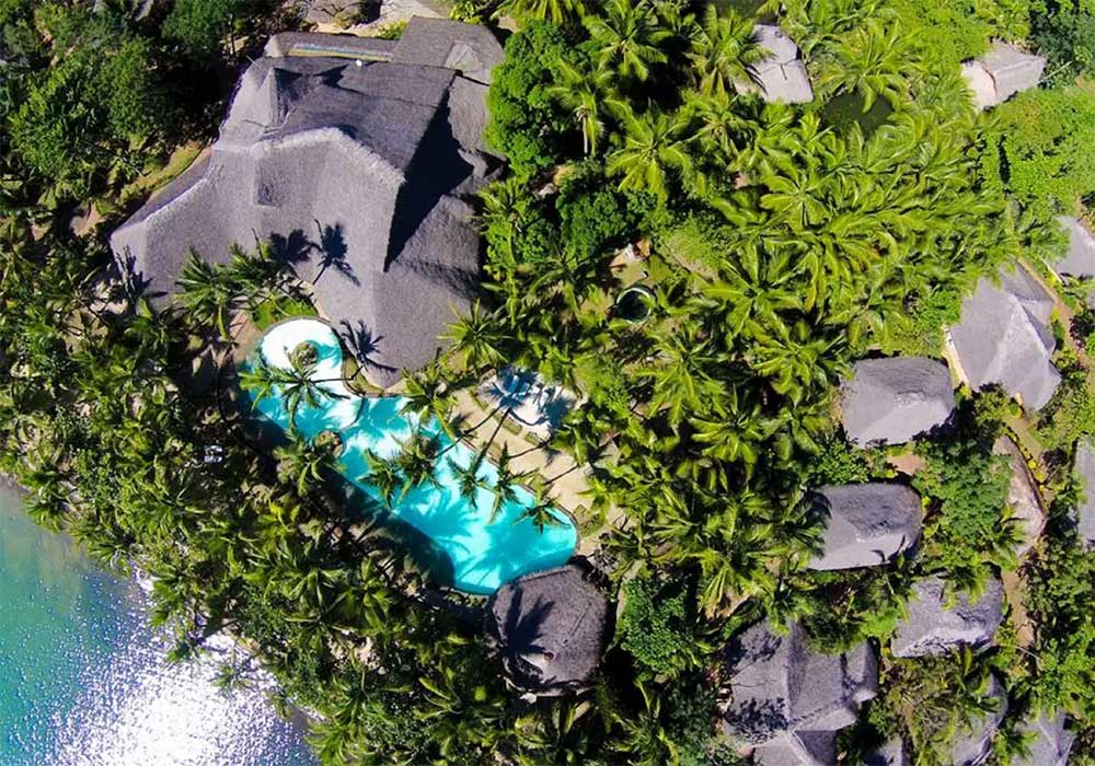 Luxury stay at Ravintsara Wellness Hotel, Nosy Be, Madagascar. Enjoy a beachfront escape, spa, and authentic charm with Madagascar specials.