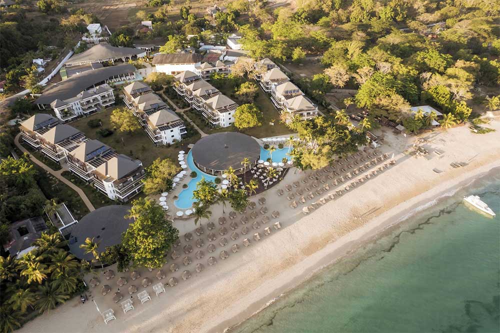 Aerial view of Royal Andilana Resort & Spa, Nosy Be, Madagascar, an idyllic retreat with pristine beaches and luxury services for Madagascar specials.