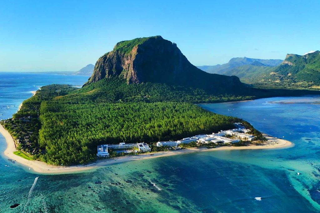 Riu Palace Mauritius in Le Morne, Mauritius, an adults-only beachfront hotel with ocean views, outdoor pools, dining, wellness facilities and water sports.