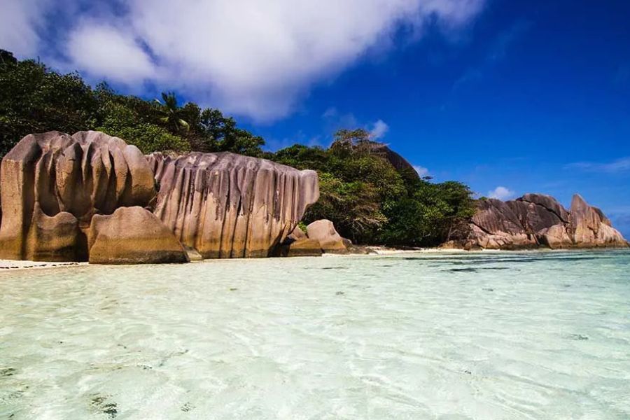Iconic granite rocks and crystal-clear water at Anse Source d’Argent, Seychelles