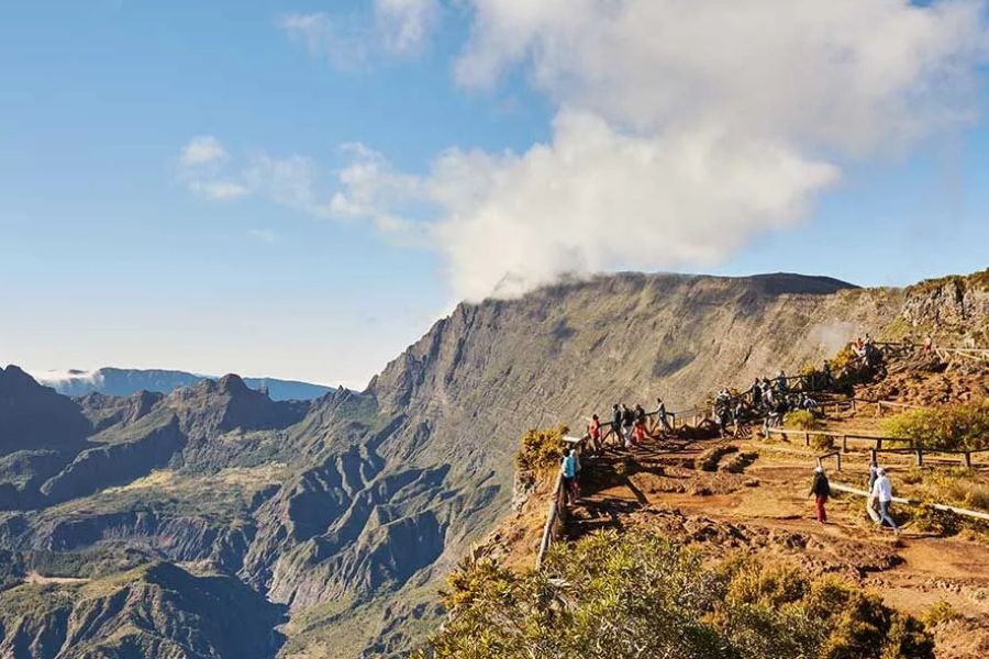 Hiking viewpoint overlooking the dramatic volcanic peaks of Réunion Island.
