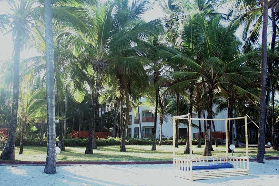 Palm-filled beachfront resort offering a peaceful Zanzibar island escape.