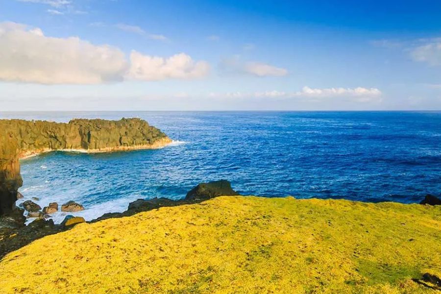 Dramatic volcanic coastline and deep blue ocean on Réunion Island