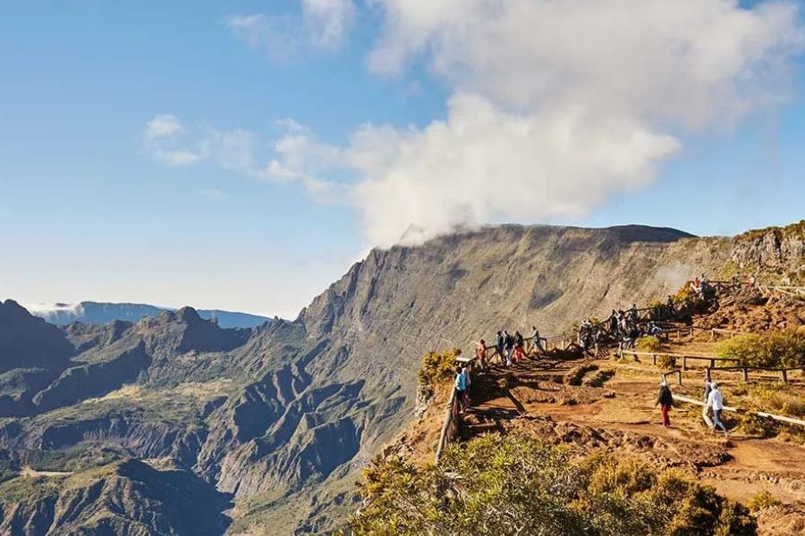 Hiking viewpoint overlooking Réunion Island’s dramatic volcanic mountains.