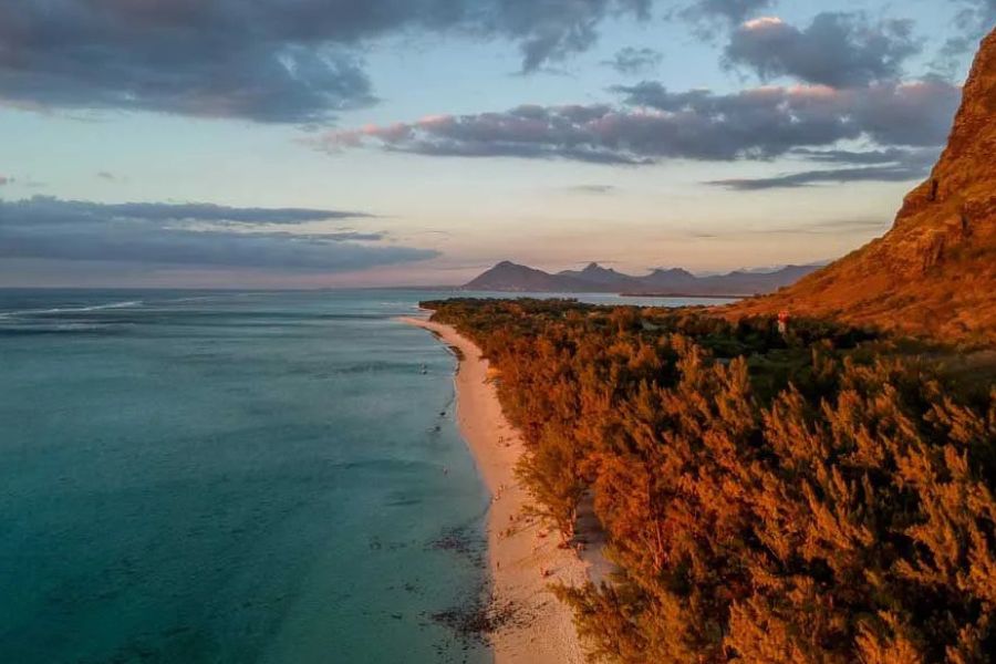 Sunset along Le Morne’s mountain-backed coastline in Mauritius.