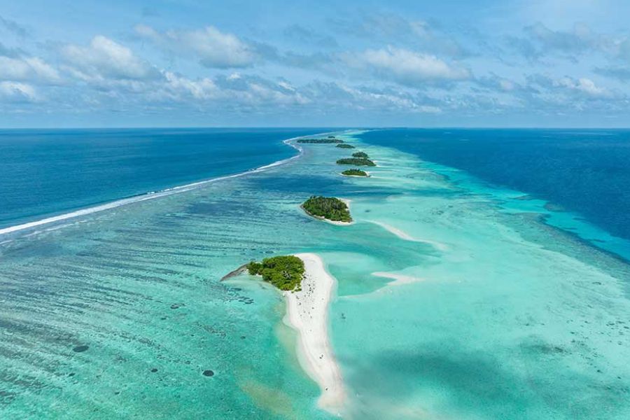 Overwater villas and turquoise lagoon in the Maldives