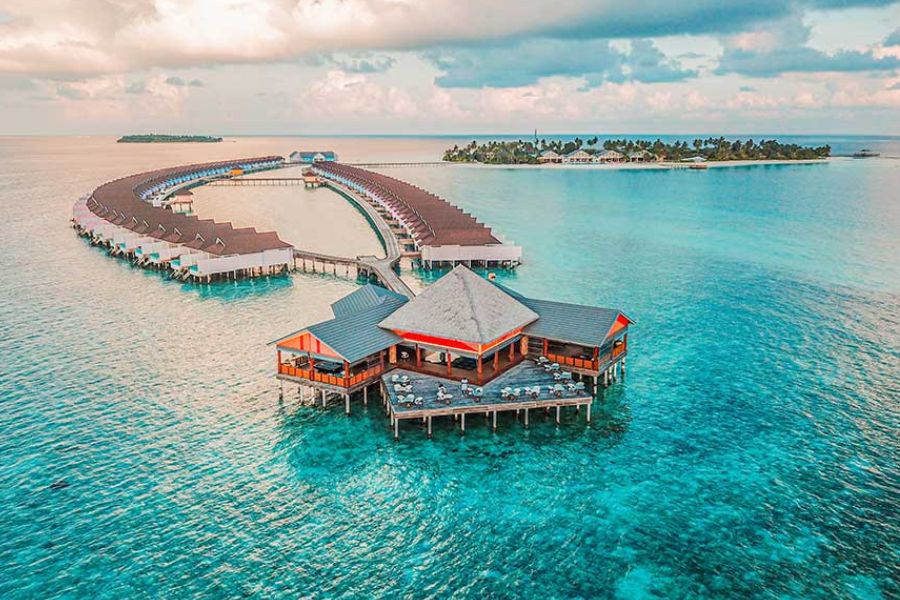 Overwater villas in a Maldives lagoon