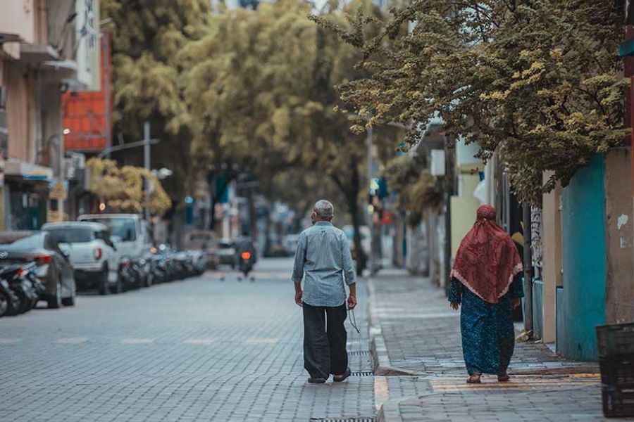 Couple walking in the streets of Malé in the Maldives