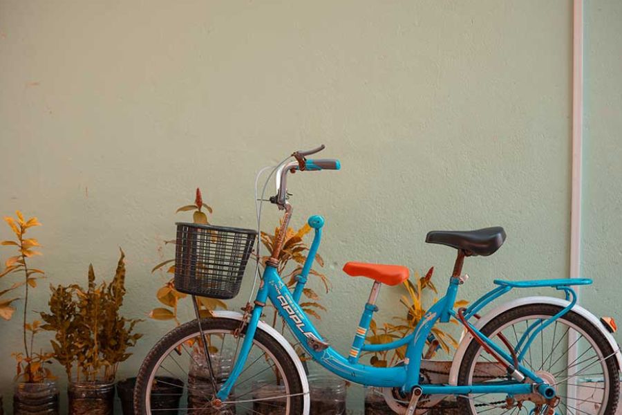 Bike parked at the front of a house in Malé, Maldives