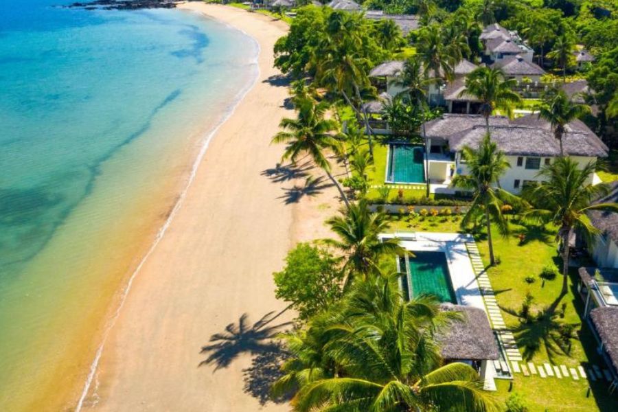 Beachfront villas and swimming pool at Home The Residence, Ankalampo, Madagascar.