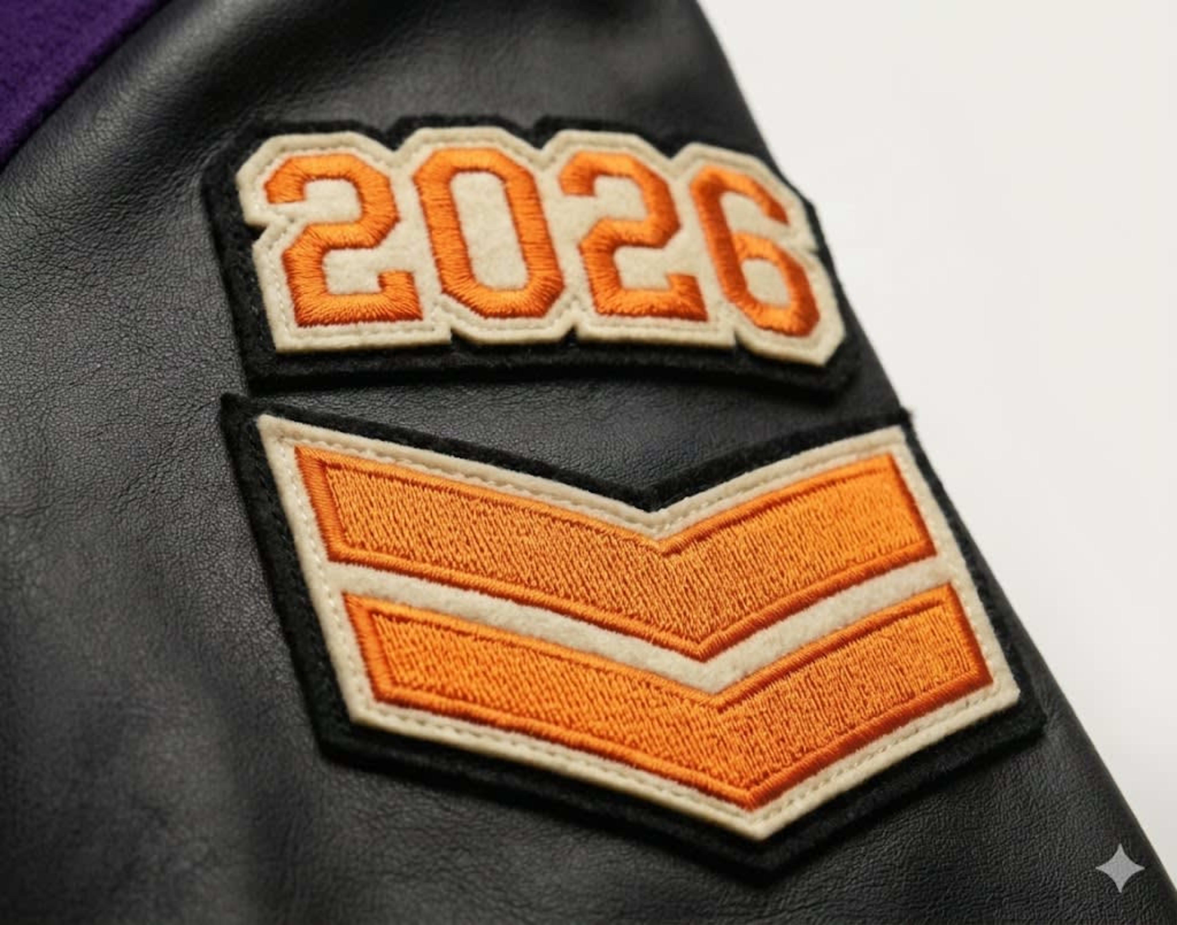 Year patch and chevron felt pieces with embroidery