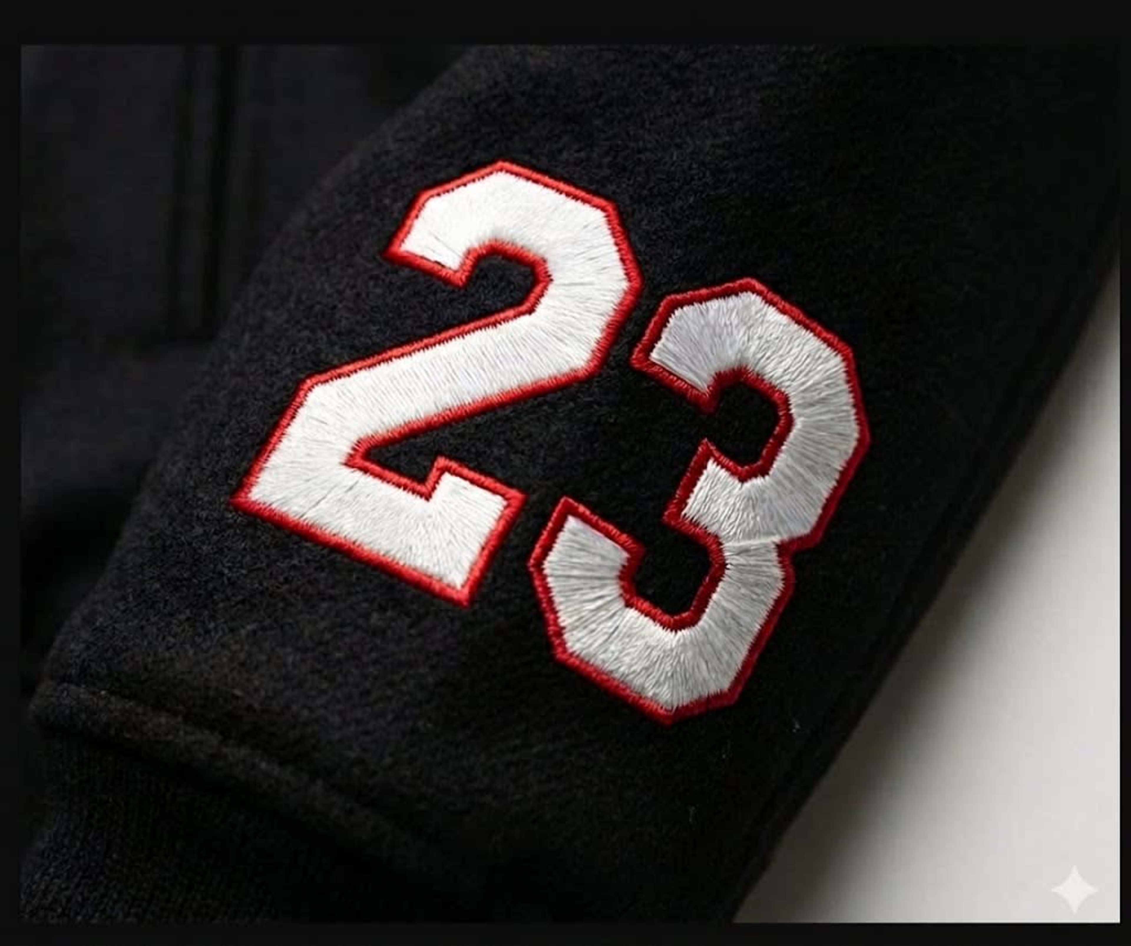 Year embroidery on sleeve