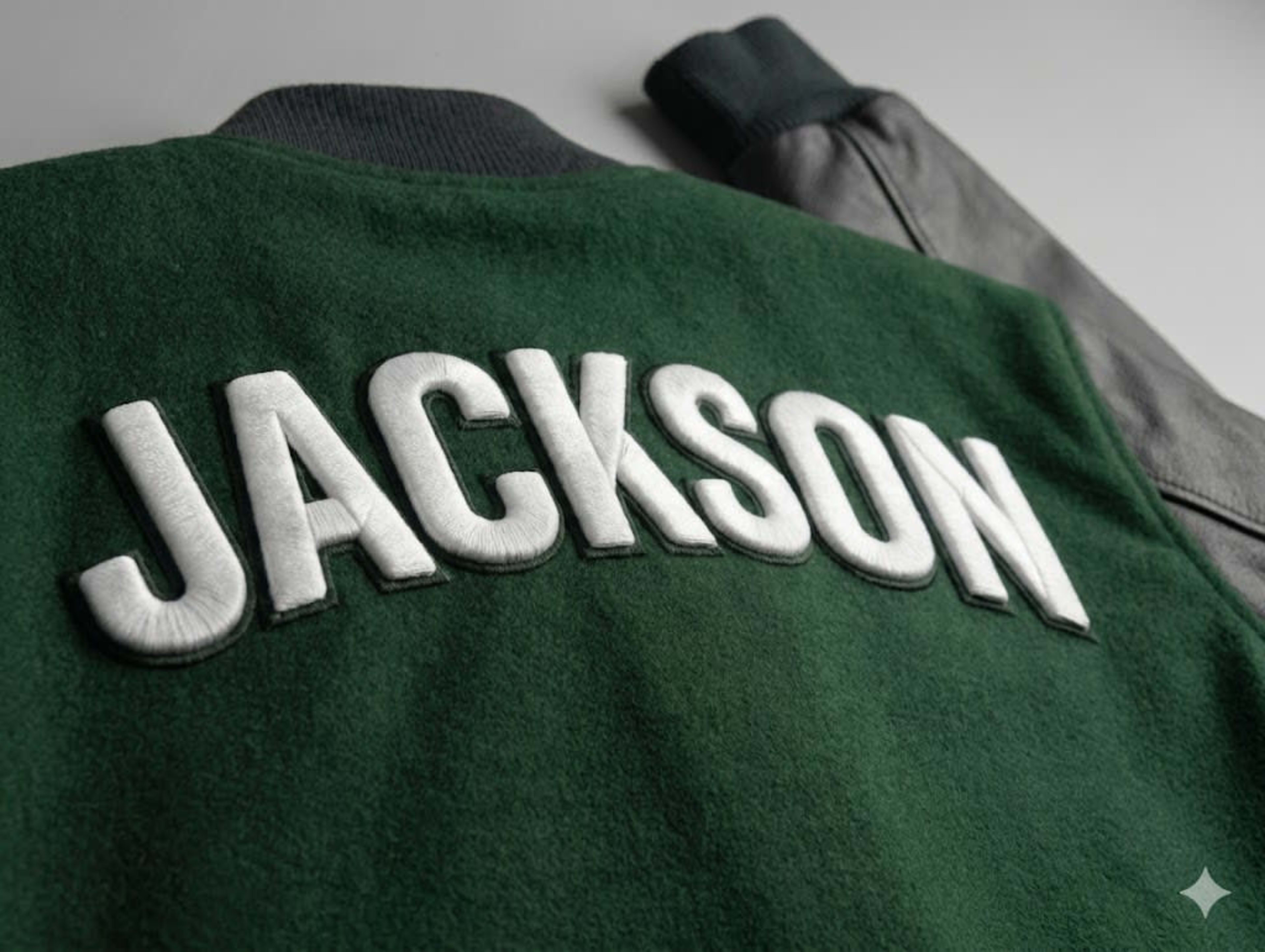 Puffed name on jacket back