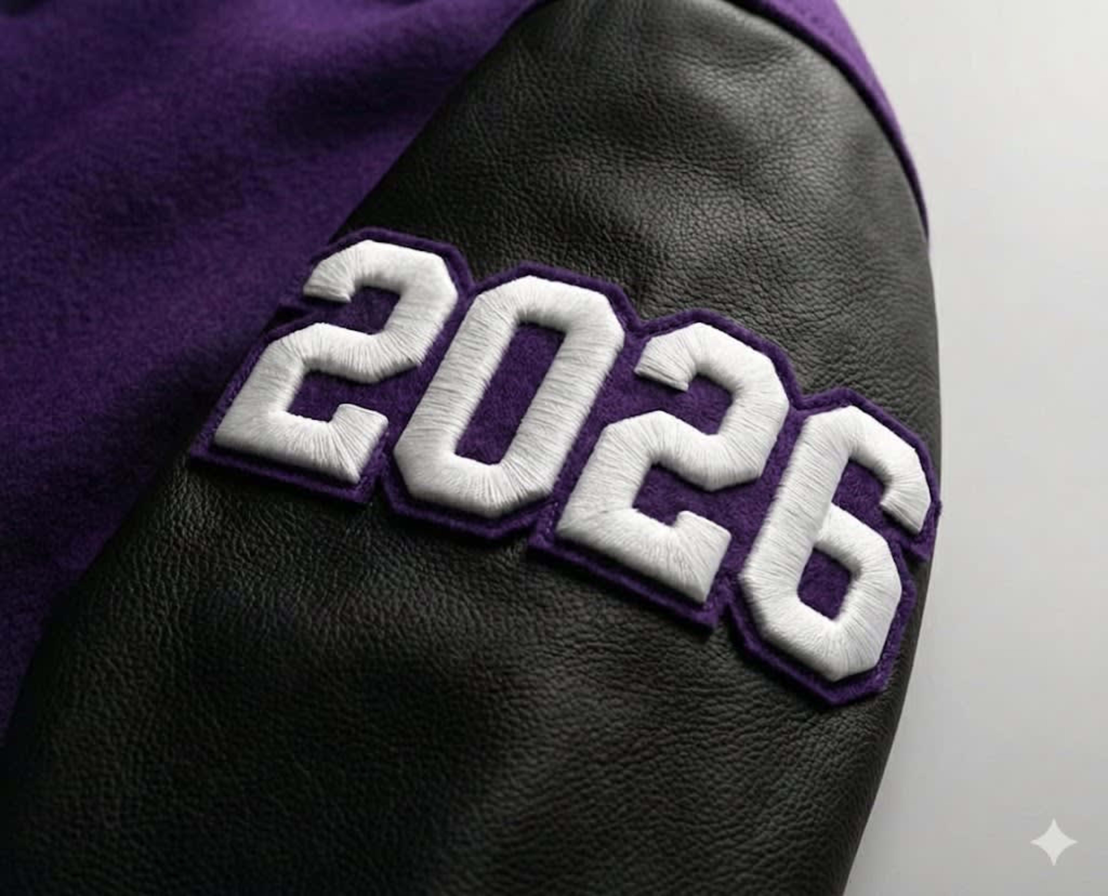Raised year embroidery on sleeve