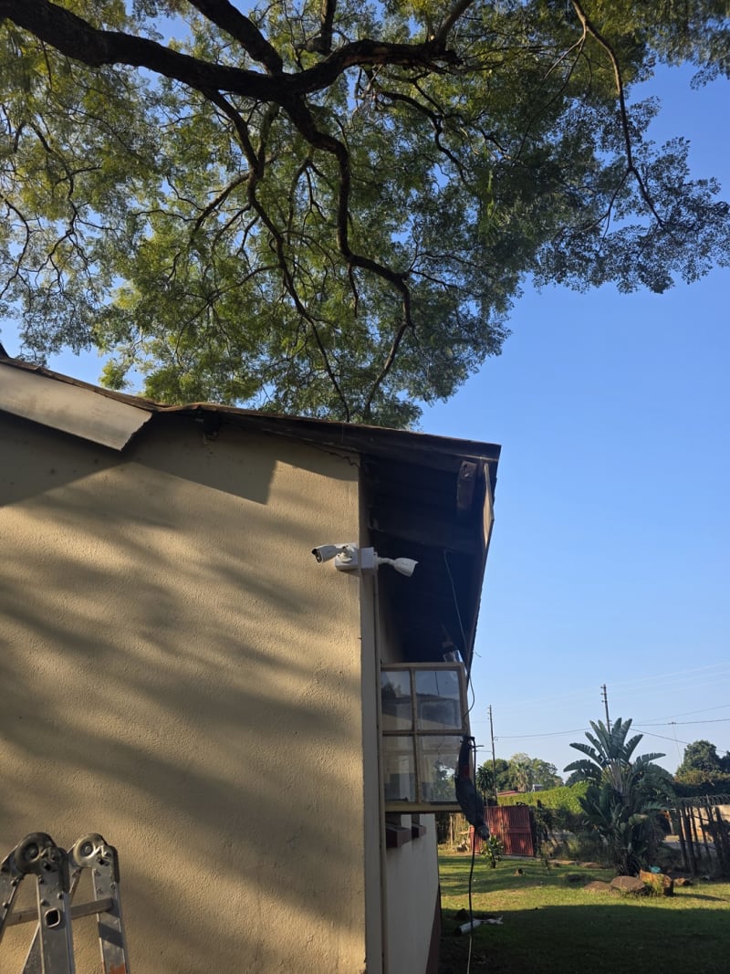 Installing outdoor CCTV cameras at strategic positions around the property.