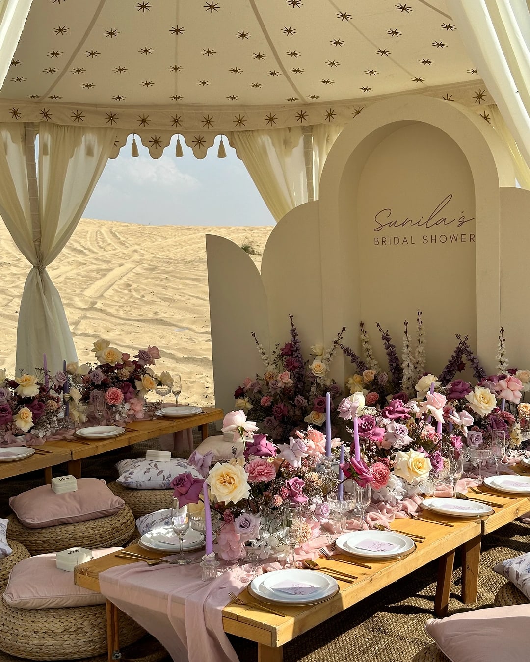Luxury bridal shower setup in the desert with elegant table styling, floral décor and canopy seating