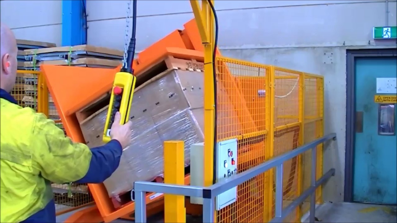 A fully automatic pallet changer integrated into a conveyor line, showcasing a hands-off safety solution