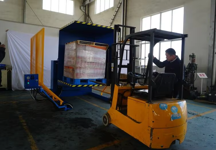 A pallet changer being used in a warehouse application