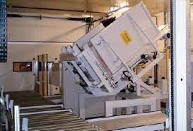 A pallet changer machine handling goods in a cold storage environment, showcasing its utility in food-grade operations.