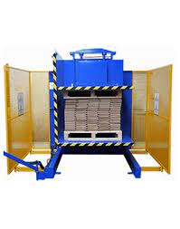 A versatile pallet changer handling non-standard pallets in a warehouse setting