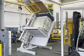 A pallet changer used in a pharmaceutical setting, highlighting cleanliness and precision.