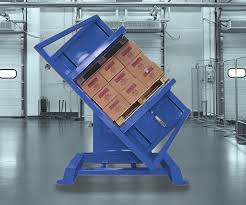A pallet changer being used in a modern, clean warehouse setting, emphasizing its role in logistics and supply chain.
