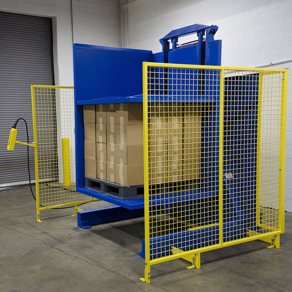 An automated pallet changer in a clean warehouse environment, highlighting worker safety features