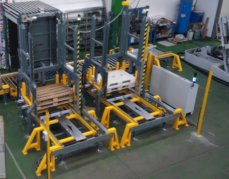 A versatile pallet changer system in a busy warehouse.