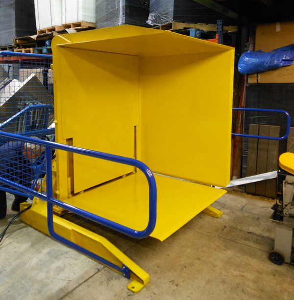 A pallet inverter designed for ergonomic use, shown in a bright and modern facility