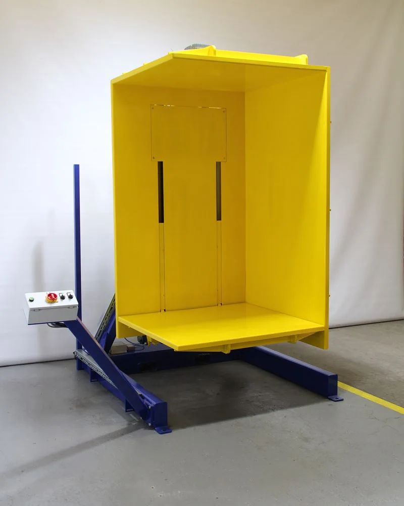 A heavy-duty pallet inverter handling a large load in an industrial setting
