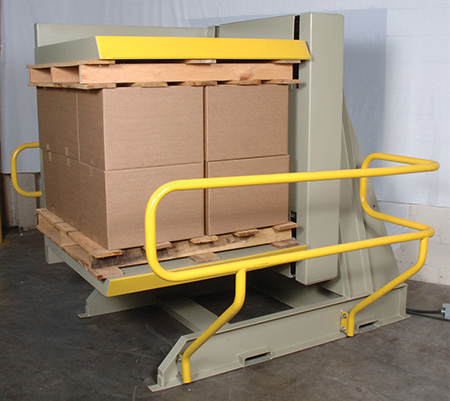 A pallet inverter in a compact warehouse, demonstrating space-saving benefits