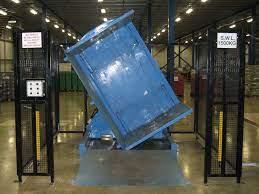 A pallet inverter equipped with load sensors for precise handling.