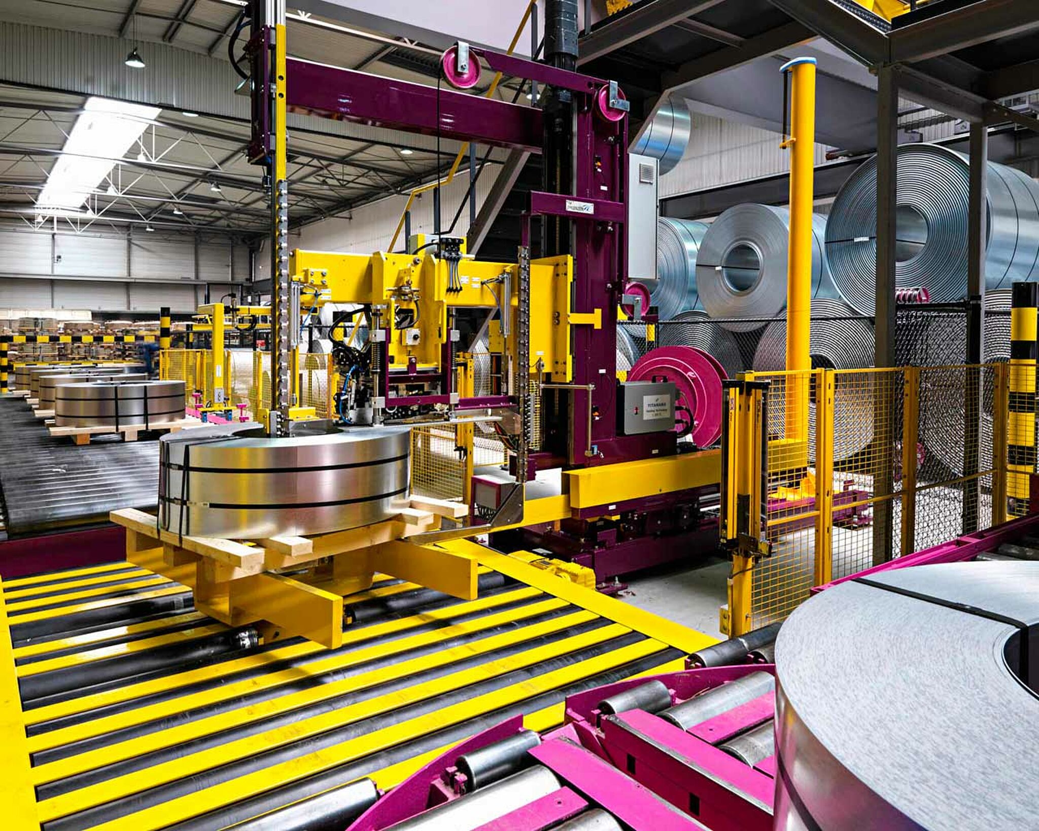 Automatic steel coil handling machine
