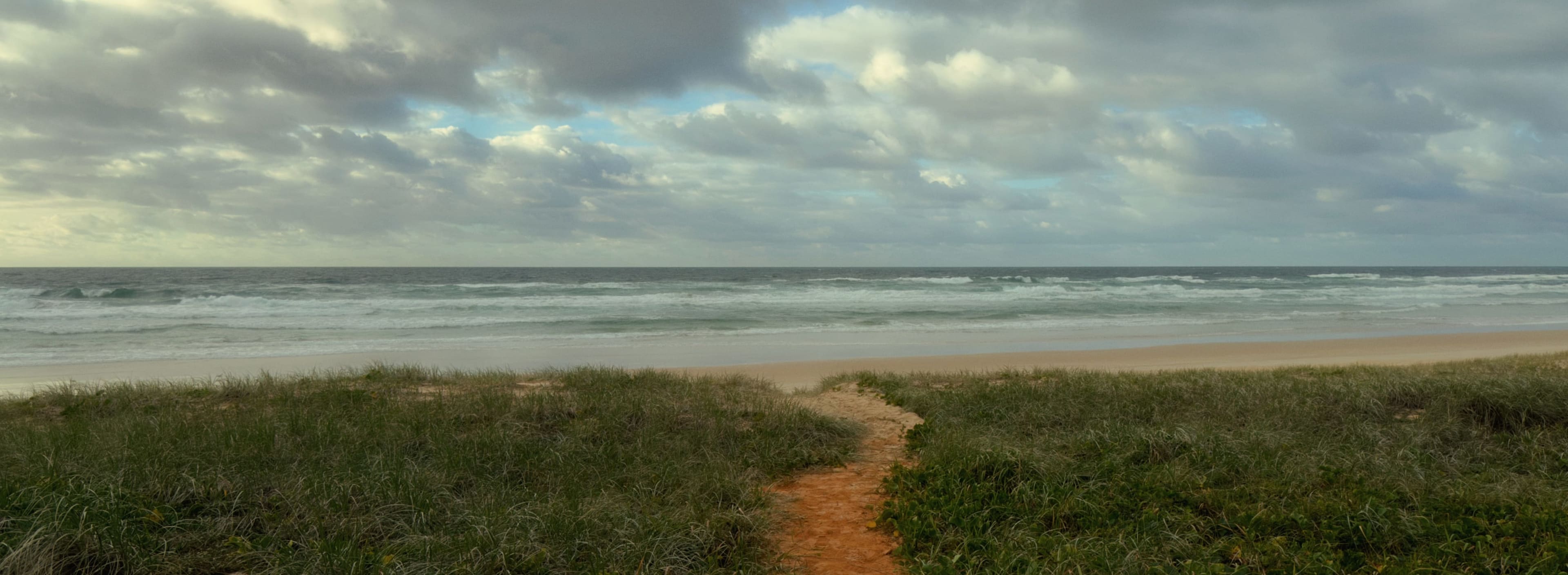 Dunes and breaking surf