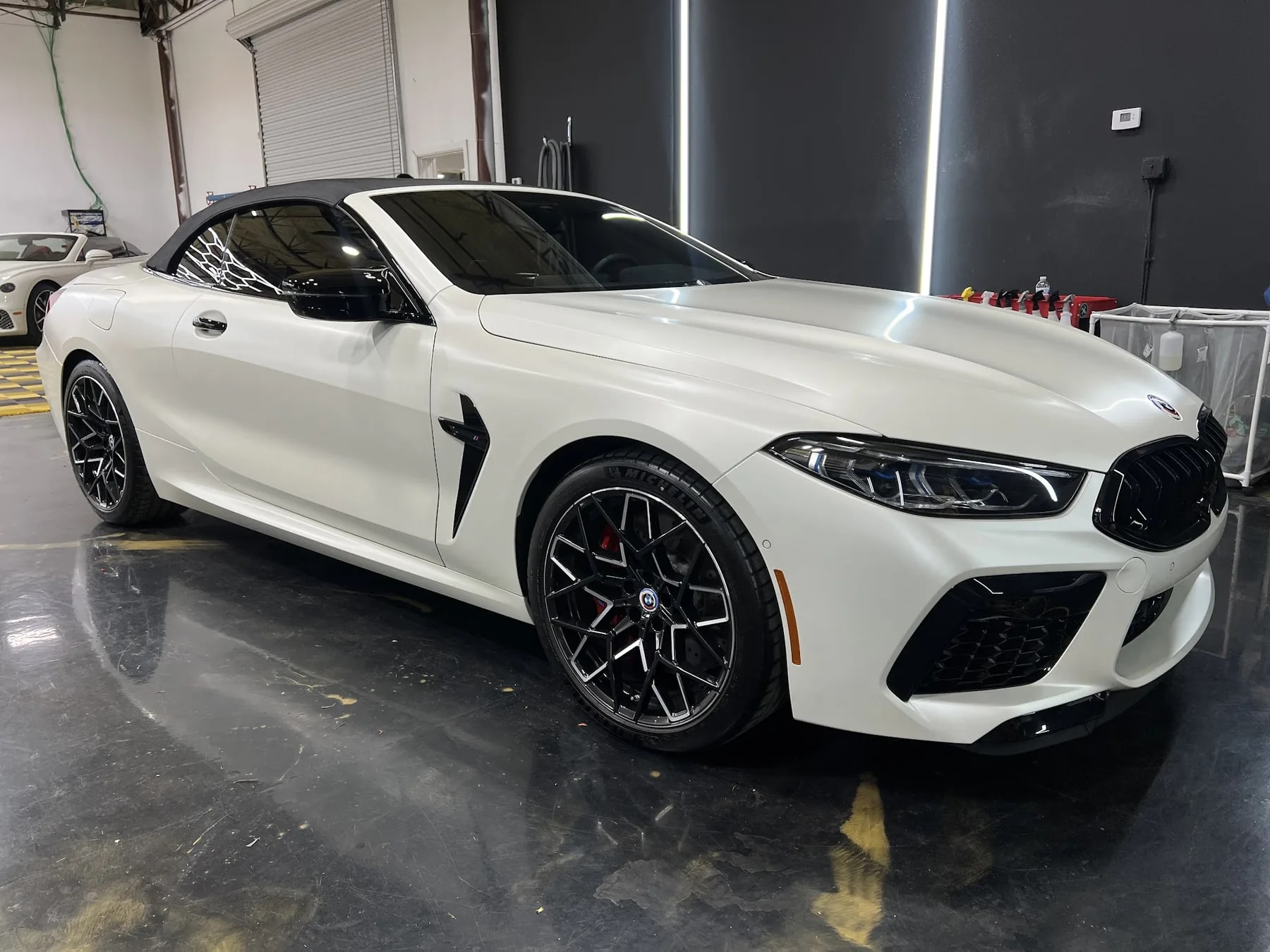 White BMW M8 Coupe exterior detailing at Prismatic Car Care in Forney, TX