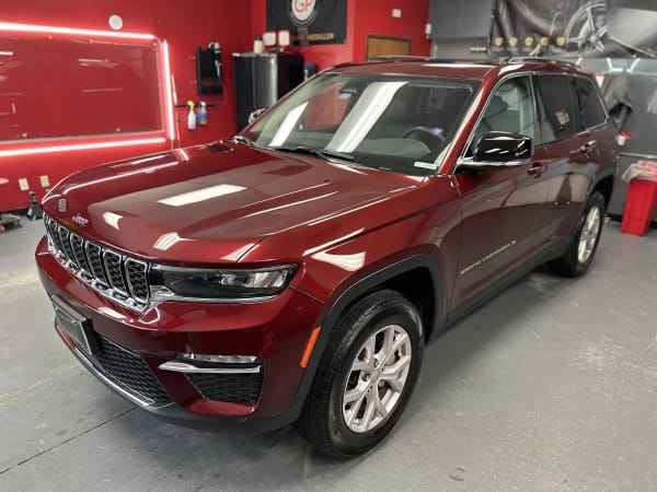 Red Jeep Grand Cherokee ceramic coating at Prismatic Car Care in Forney, TX