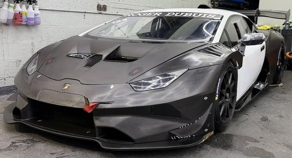 Matte carbon vinyl wrap on a Lamborghini completed by SetA Wheels