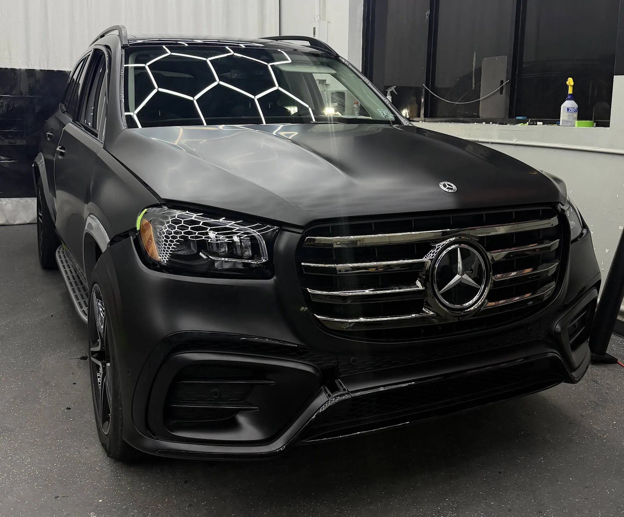 Matte black vehicle wrap on a Mercedes by SetA Wheels