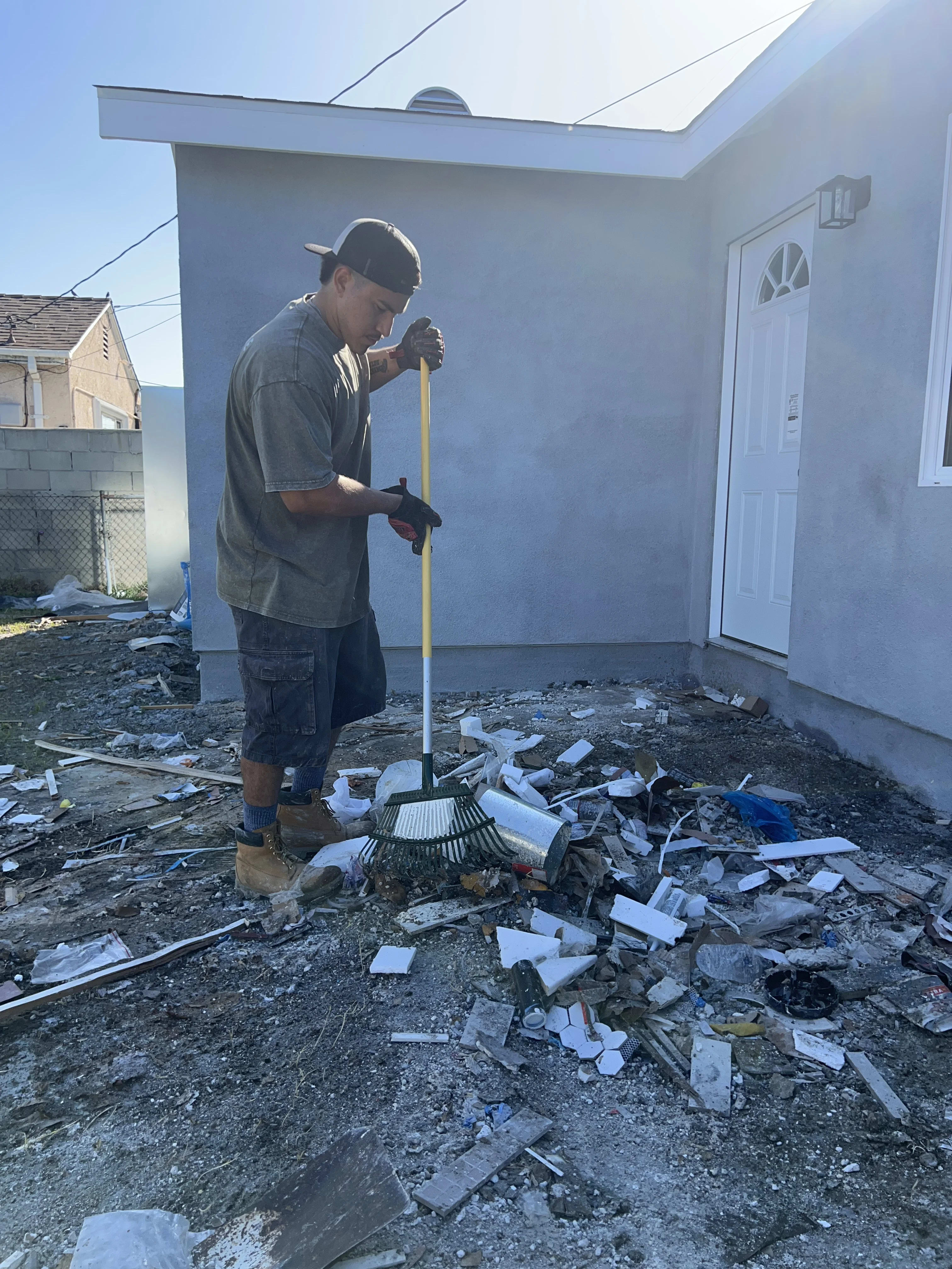 Steel Horse Transport crew handling demolition debris cleanup in Lakewood CA