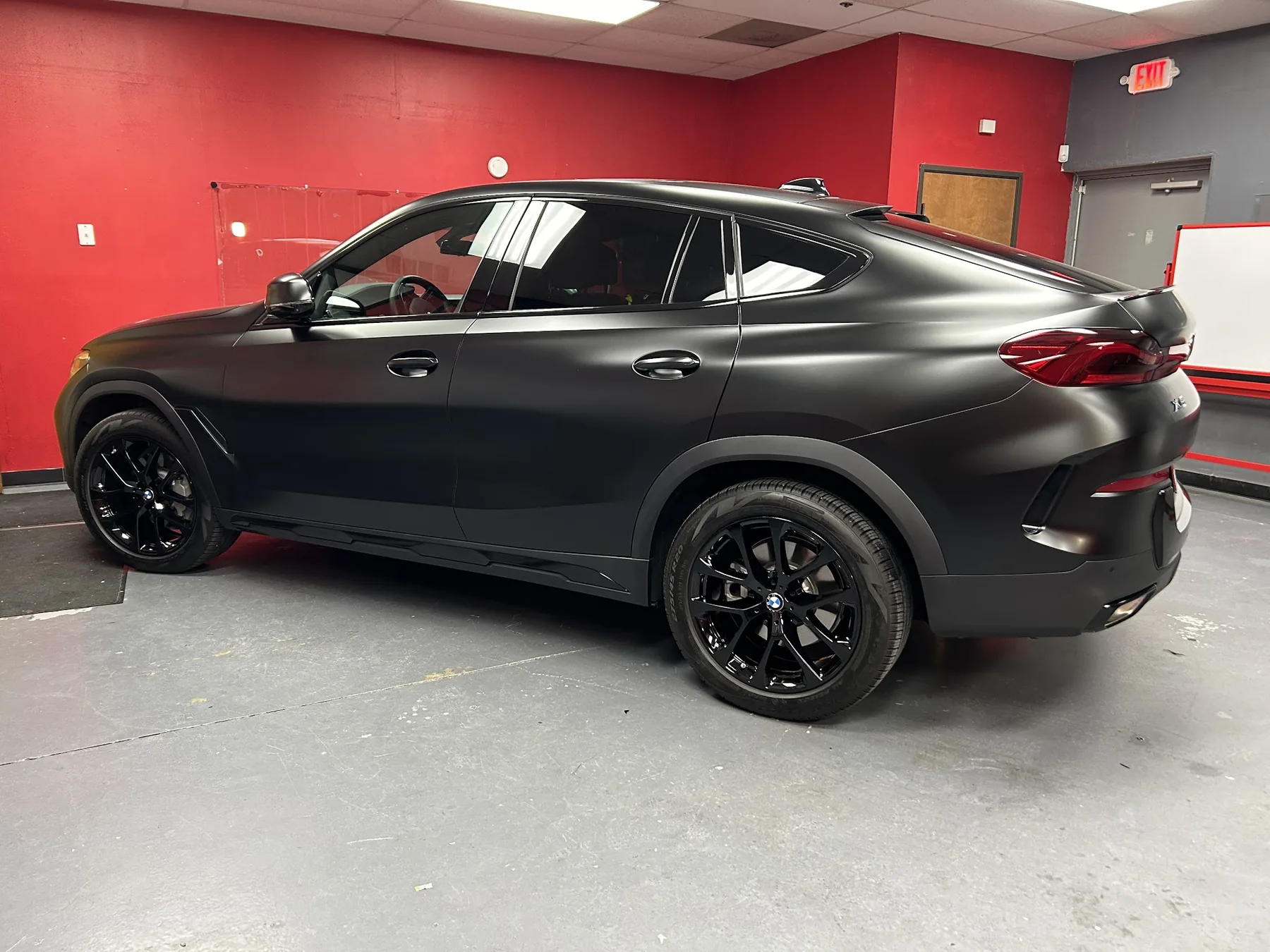 Black BMW X6 ceramic coating application at Prismatic Car Care