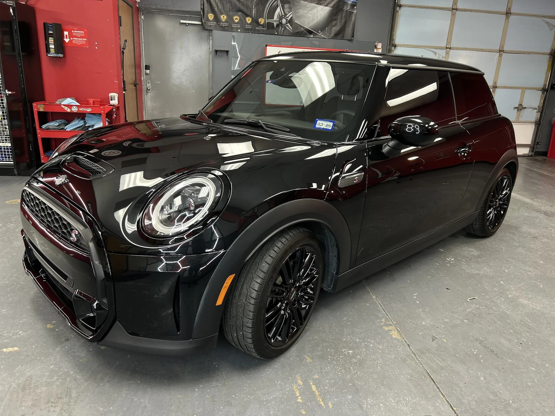 Black Mini Cooper detailing and ceramic coating maintenance