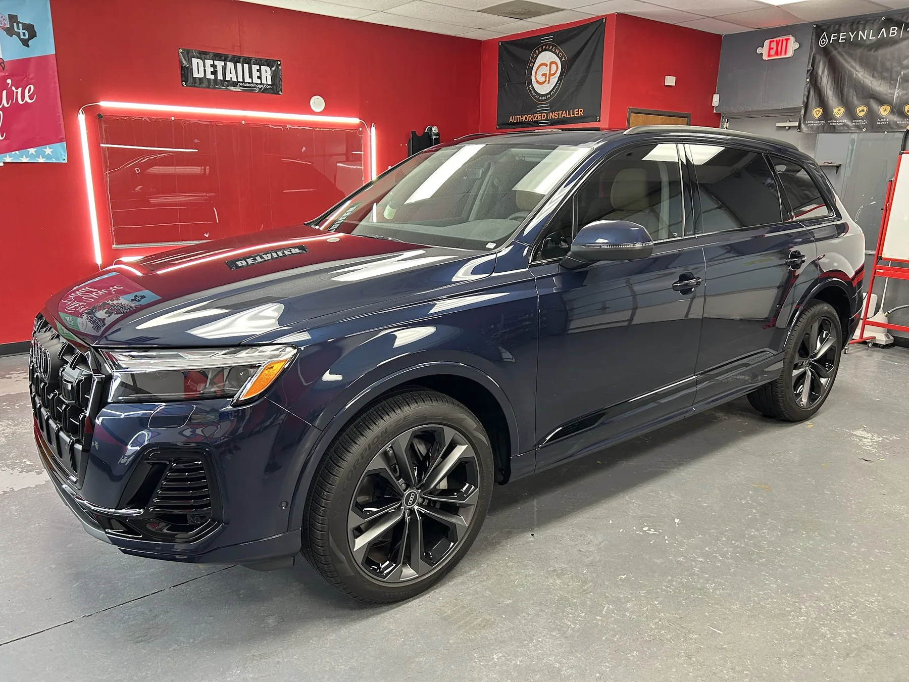 Blue Kia SUV detailing