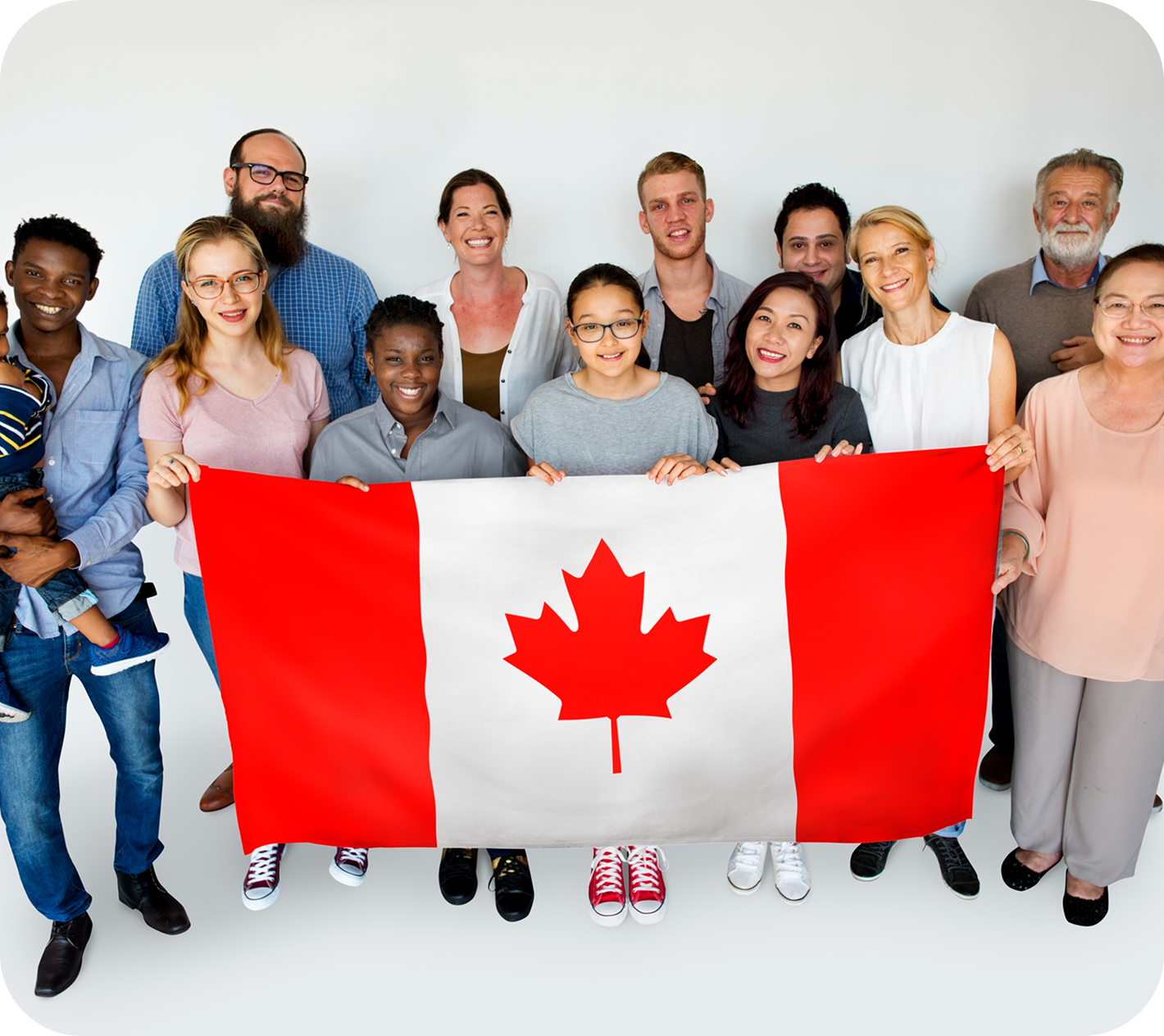 Our Work in Canada - Diverse volunteers holding Canadian flag