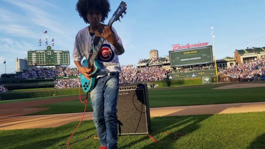 Brandon 'Taz' Niederauer Plays National Anthem At Wrigley Field