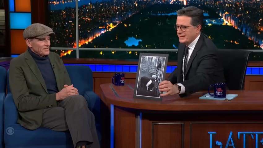 Watch James Taylor Perform & Discuss His Ode To Pet Pig ‘Mona’ On ‘Colbert’