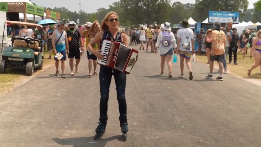 Watch Sheryl Crow Play Hits On Accordion While Rollerblading Around Bonnaroo